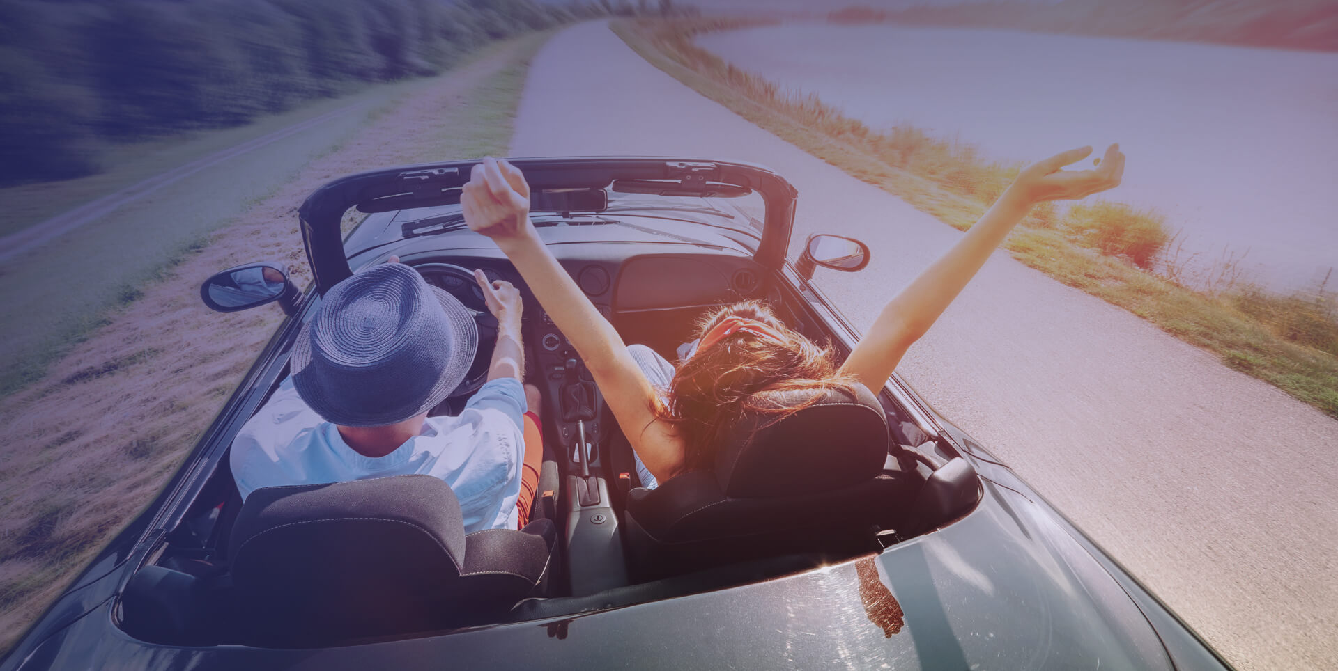 fairdeal-corfu-car-rentls-car-couple-driving-happy