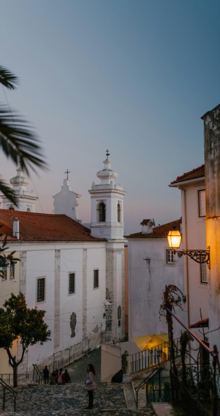 Twilight captures the Church of Sao Vicente de Fora in Lisbon's urban setting.
